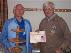 The monthly winner Mick Adams receiving his certificate from Dave Reeks